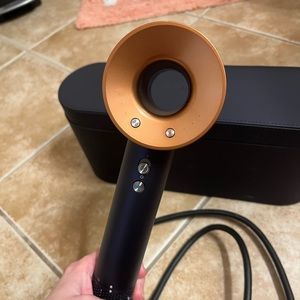 Dyson hair dryer with multiple attachments only used a few times